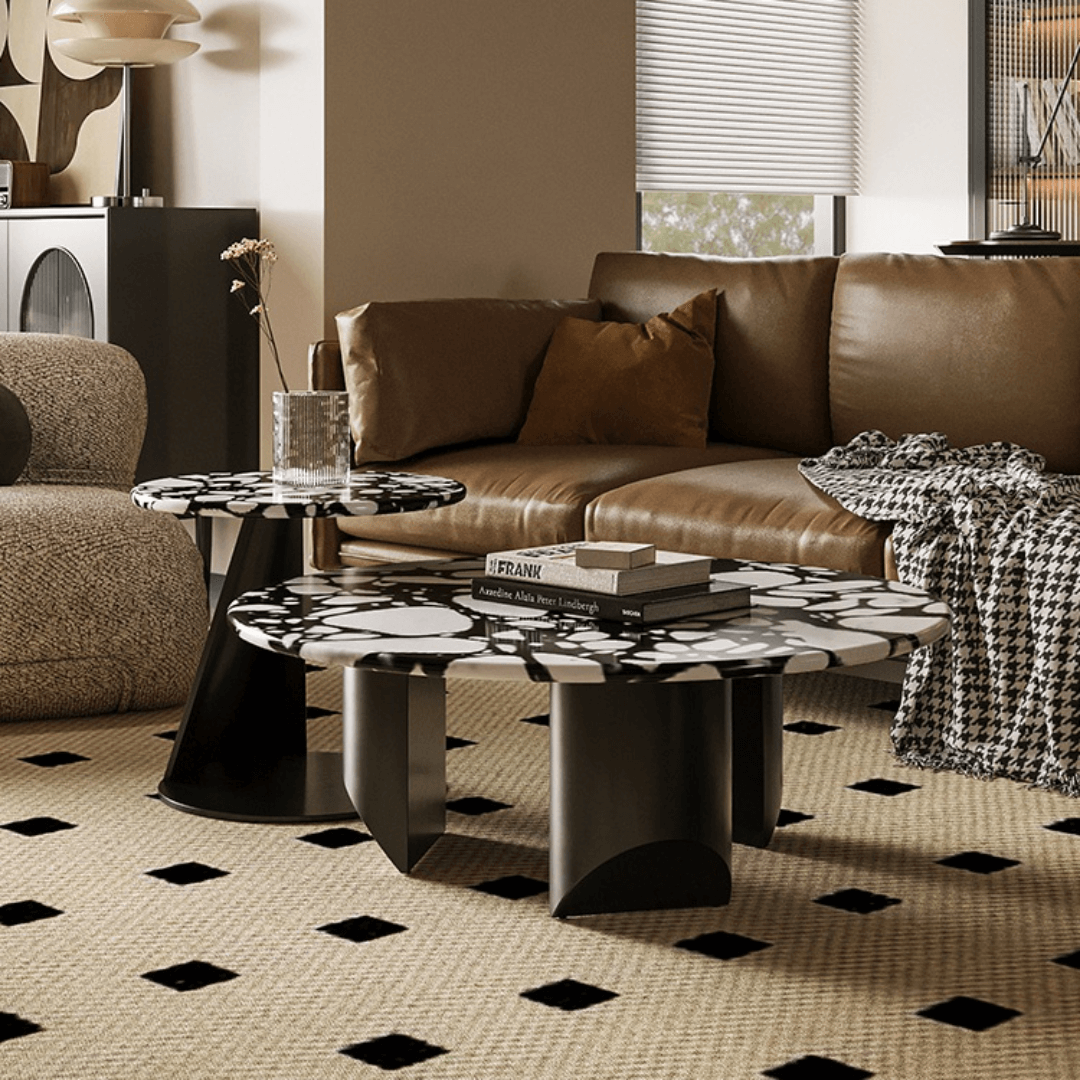 Round terrazzo coffee table set with black and white pattern, perfect for modern living rooms