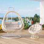 Pink metal 2-seater porch swing with stand, chain, and cushions for outdoor seating