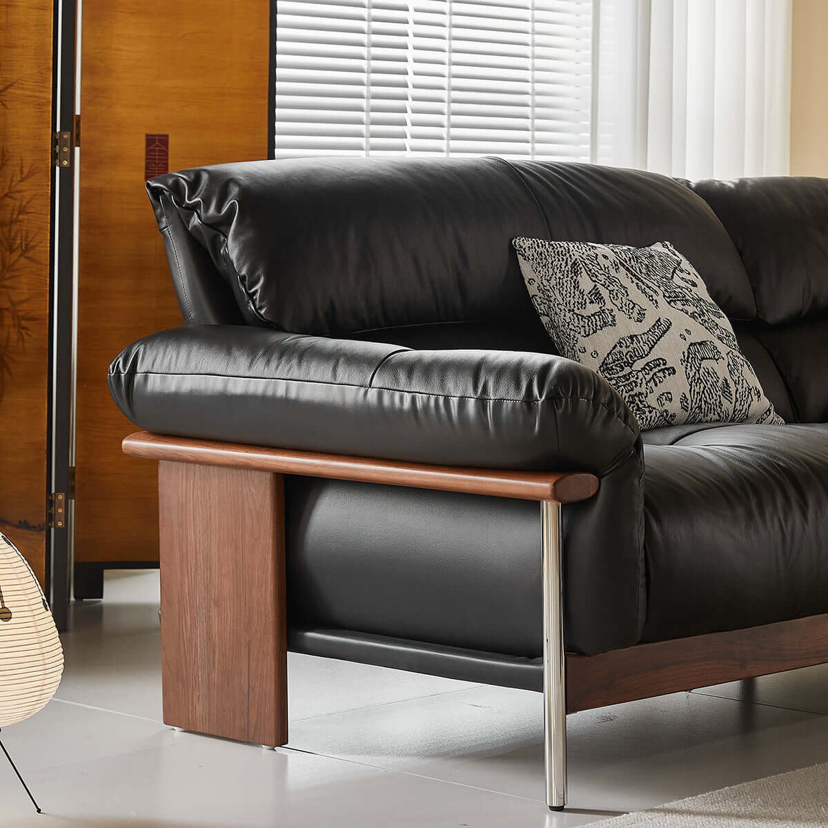 Three-seater sofa with straight-line design and top-grain leather upholstery
