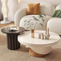 Modern circular coffee table set featuring fluted base in dual-tone finish