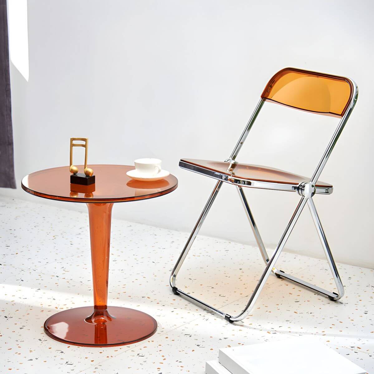 Scandinavian style dining chair with silver metal legs and plastic acrylic seat main product image