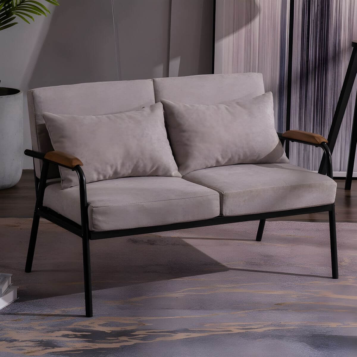 Mid century modern 2-seater sofa with black metal frame and solid wood arms