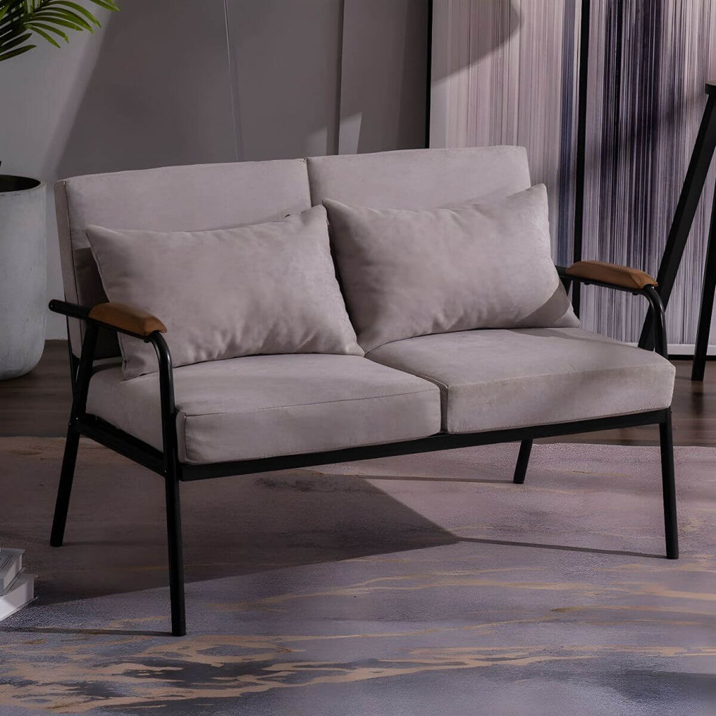 Mid century modern 2-seater sofa with black metal frame and solid wood arms