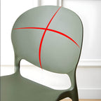 Scandinavian plastic dining chair with open back and four legs, ideal for home use