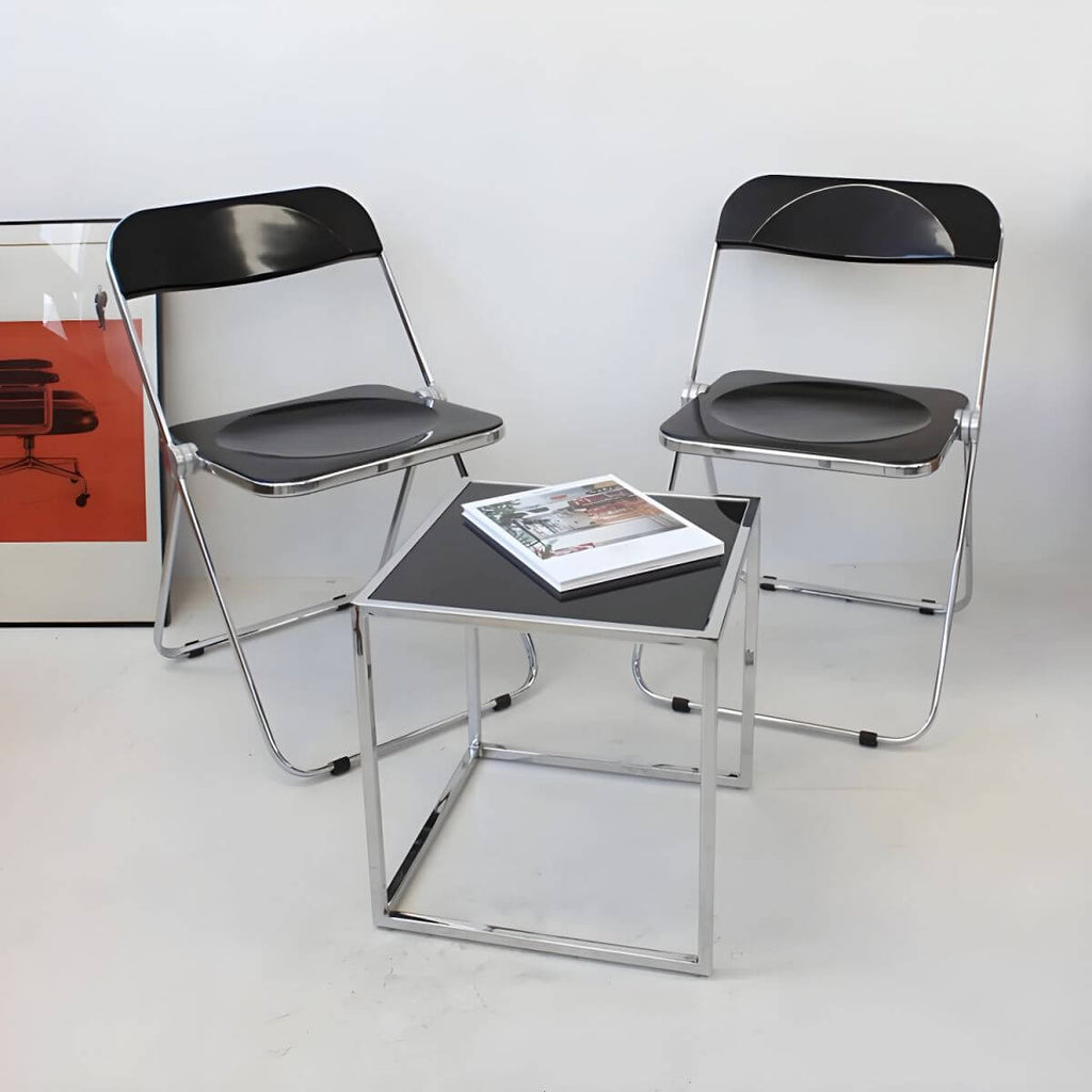 Contemporary acrylic folding armless chair with open back, ideal for dining rooms