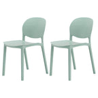 Stackable Nordic dining chair with acrylic legs and ergonomic backrest for modern dining rooms