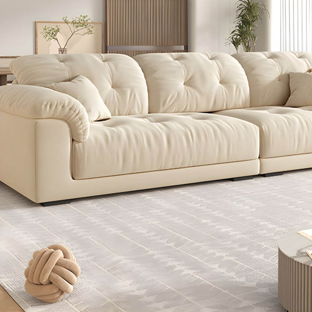 Beige polyester blend sofa with tufted back and pillow top arms, modern and comfortable seating