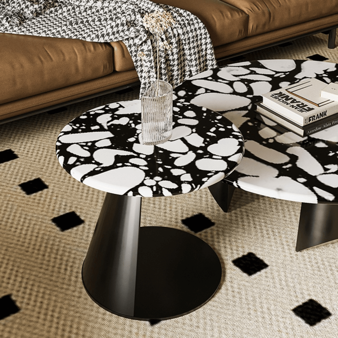 Round terrazzo coffee table set with black and white pattern, perfect for modern living rooms
