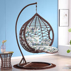 Metal porch swing with cushions, chain, and stand, designed to be heat resistant for outdoor use