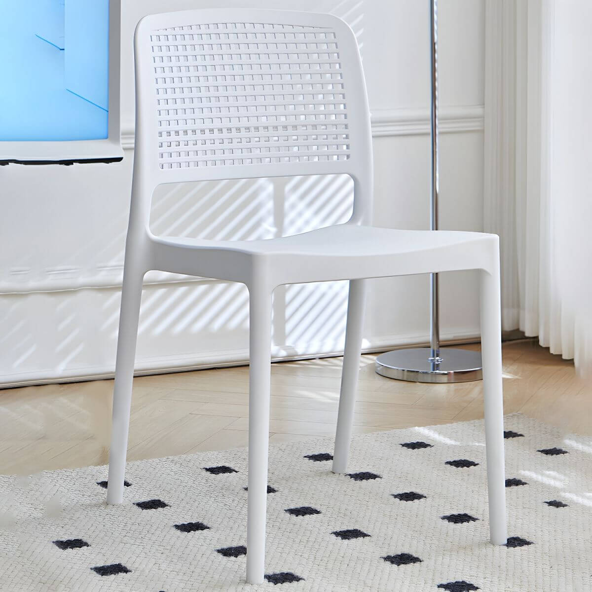 Stackable modern plastic and acrylic side chair for kitchen and dining use