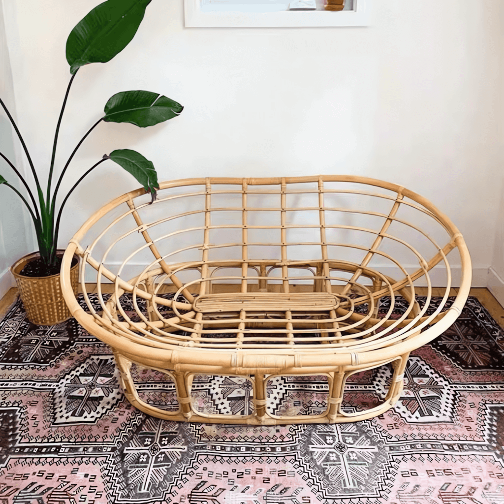 Cozy natural rattan papasan chair available in single or double size for comfortable lounging