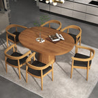 Set of four modern curved back dining chairs with walnut wooden frame and upholstered leather seats