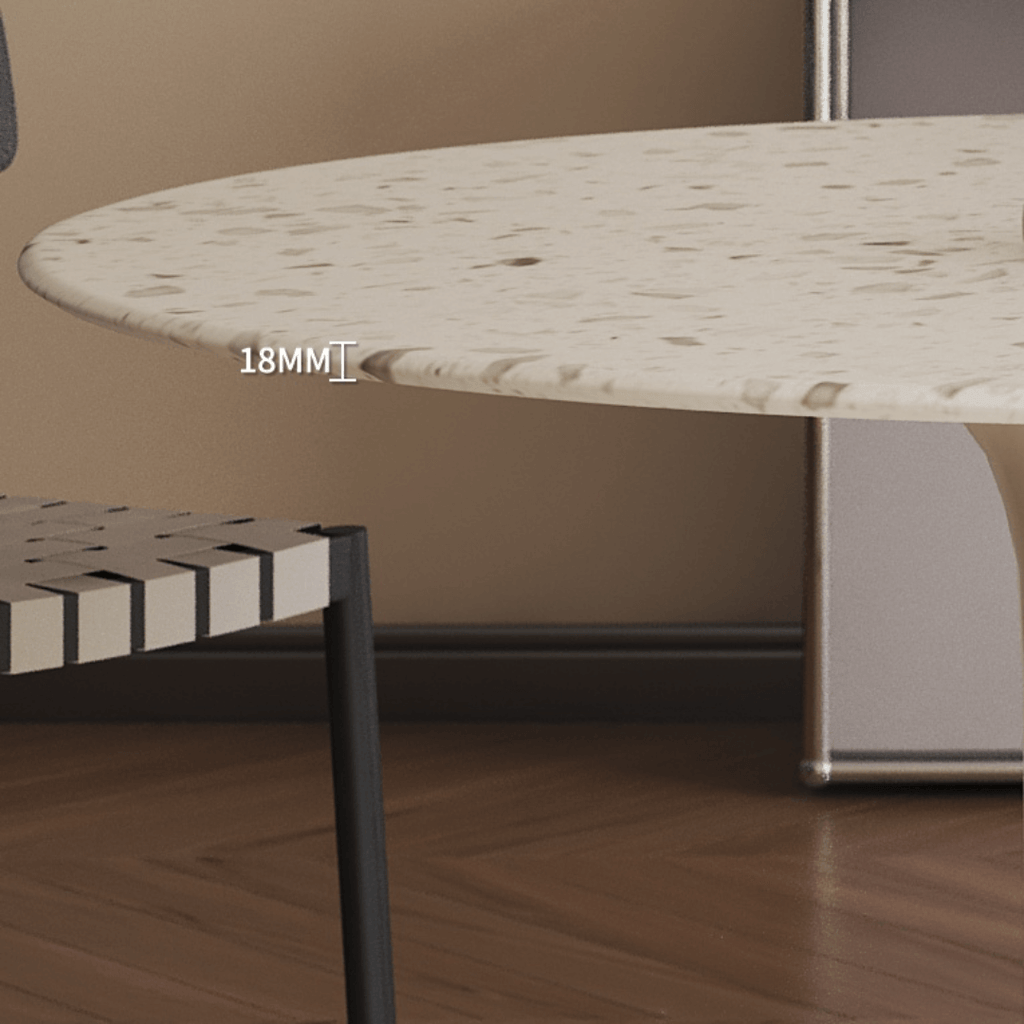 Round terrazzo dining table featuring a stylish wooden and metal base for elegant interiors