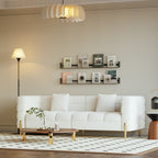 Modern white boucle upholstered fluted 3-seater sofa with pillow for living room seating