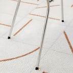 Stackable acrylic dining chair with open back and metal legs, armless design for modern dining rooms