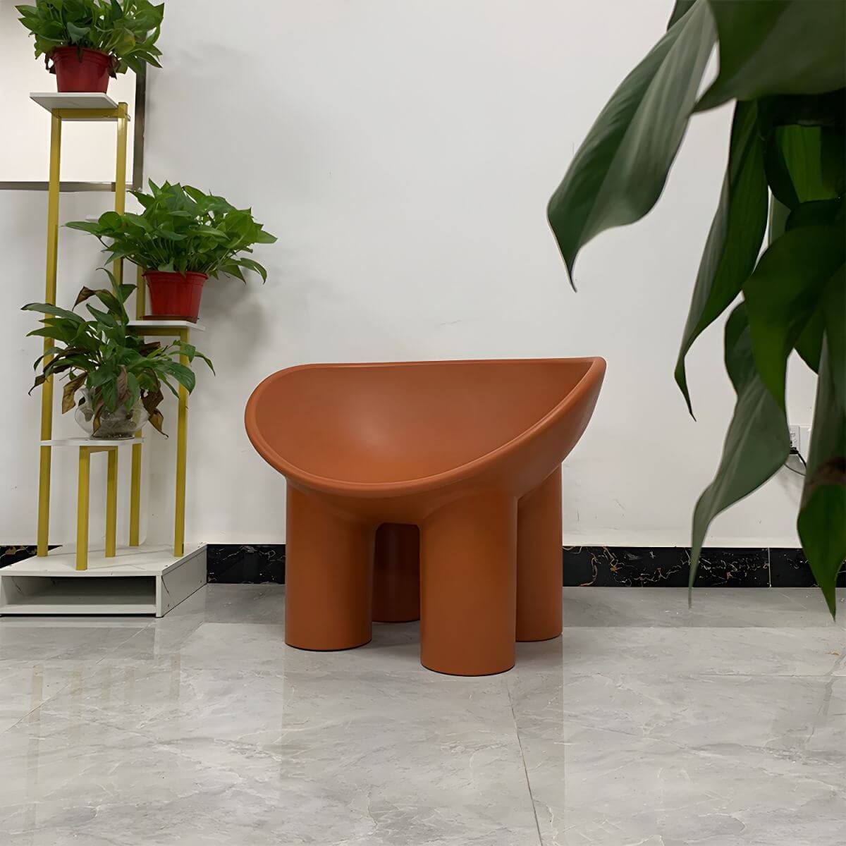 Modern armless papasan accent chair with bowl shape and elephant legs