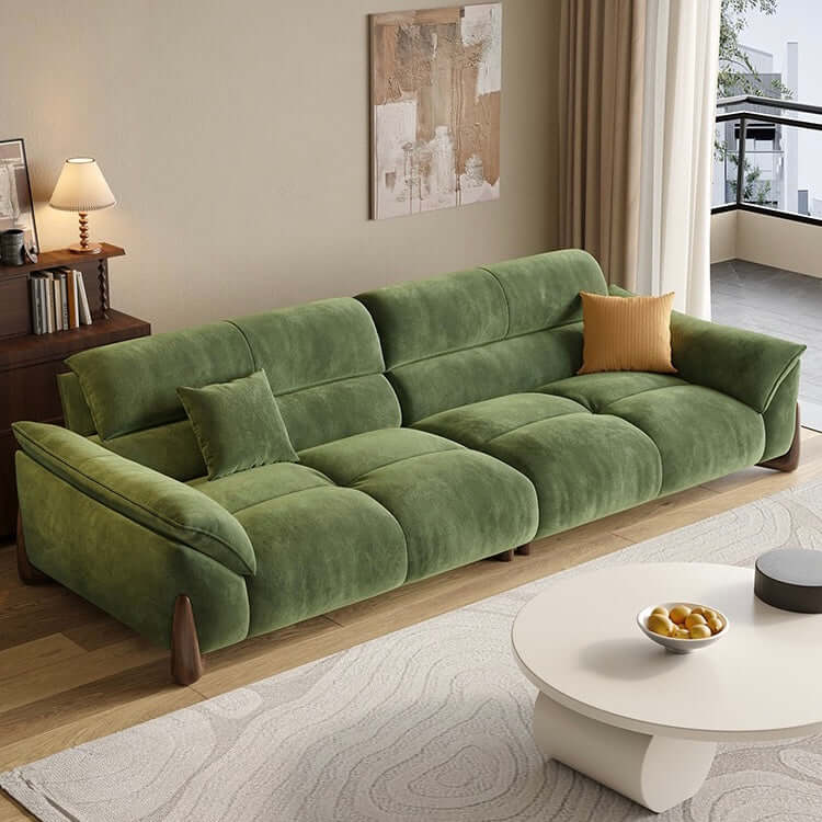 Modern green and white sofa with soft tech fabric, perfect for a cozy living room