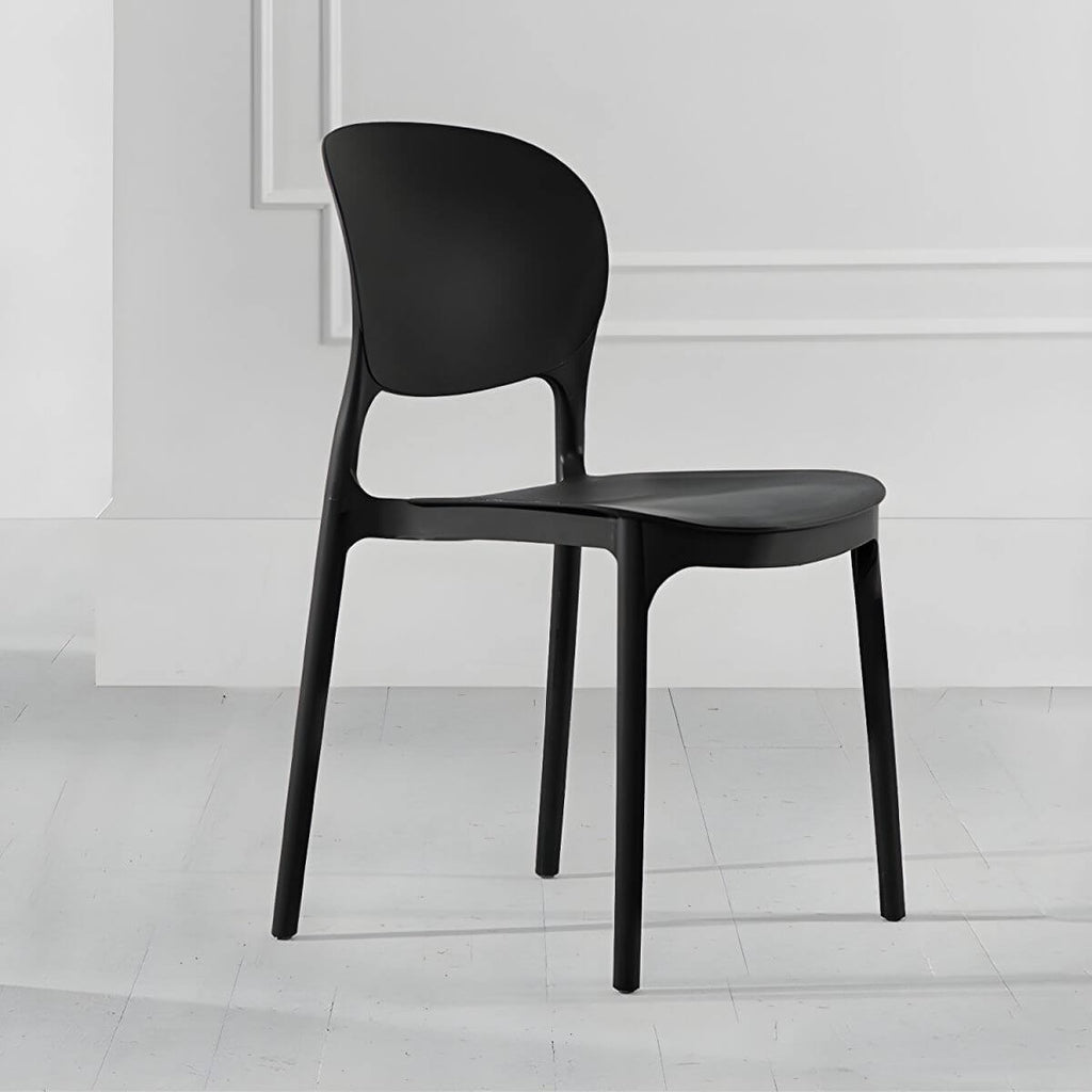 Stackable modern side chair with low back made of plastic and acrylic, perfect for contemporary dining
