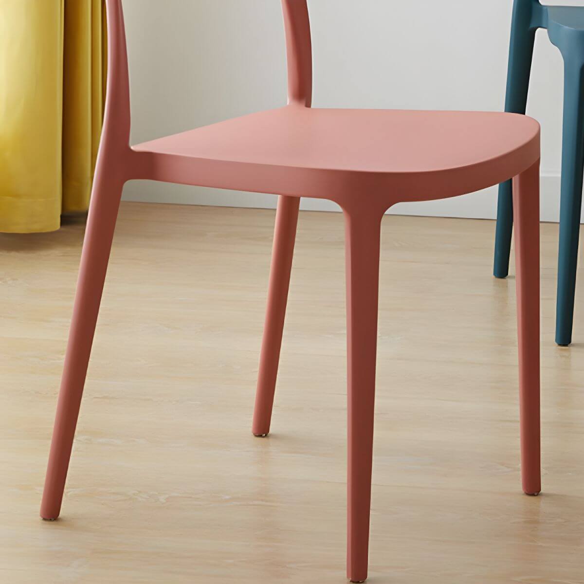 Modern Scandinavian dining chair made of plastic and acrylic, perfect for kitchen and dining areas