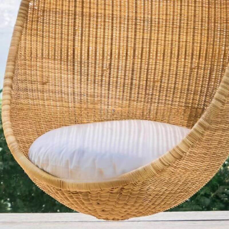 Upholstered tropical cocoa porch swing with heat-resistant plastic stand and chain