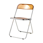 Scandinavian style dining chair with silver metal legs and plastic acrylic seat
