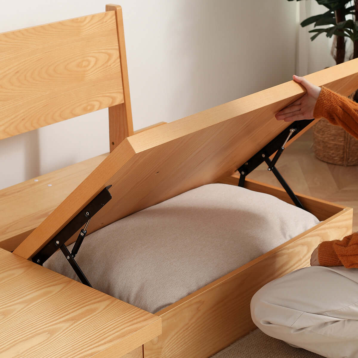 Beige cotton linen sofa with wooden frame and storage space underneath
