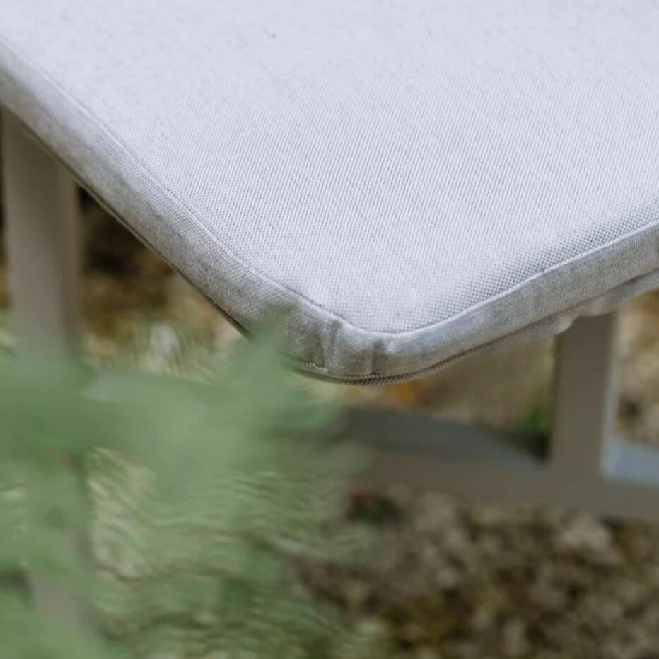 Outdoor picnic table with aluminum frame and colorful white, light green, and orange top