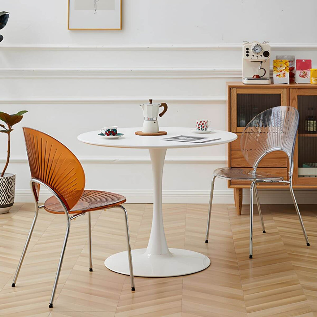 Stackable acrylic dining chair with open back and metal legs, armless design for modern dining rooms