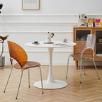 Stackable acrylic dining chair with open back and metal legs, armless design for modern dining rooms