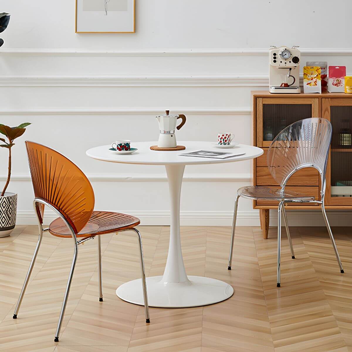 Stackable acrylic dining chair with open back and metal legs, armless design for modern dining rooms