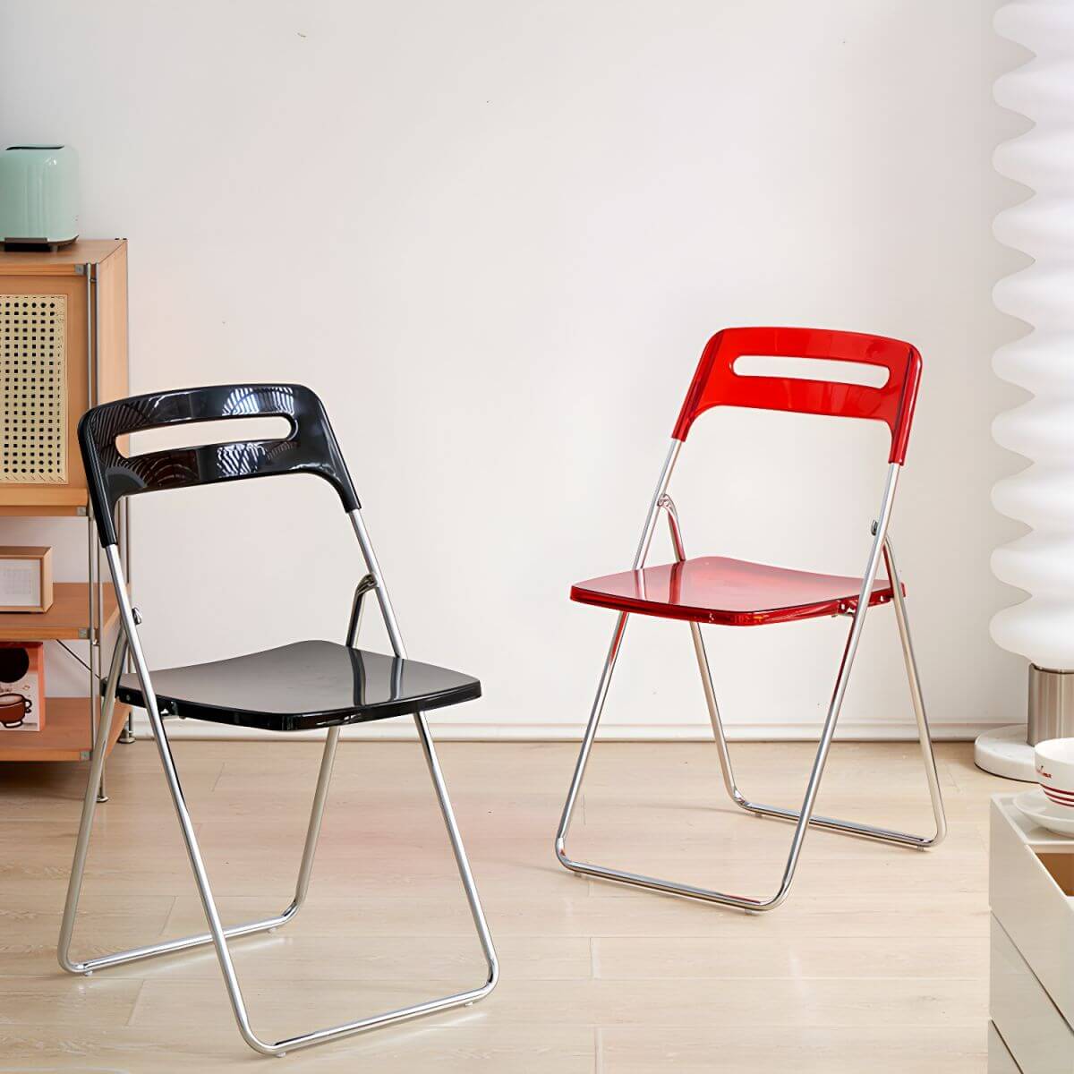 Modern collapsible open back side chair made of plastic and acrylic, ideal for kitchen and dining areas