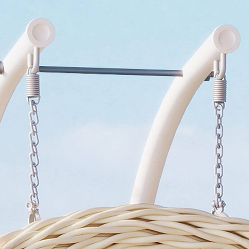 Pink metal 2-seater porch swing with stand, chain, and cushions for outdoor seating