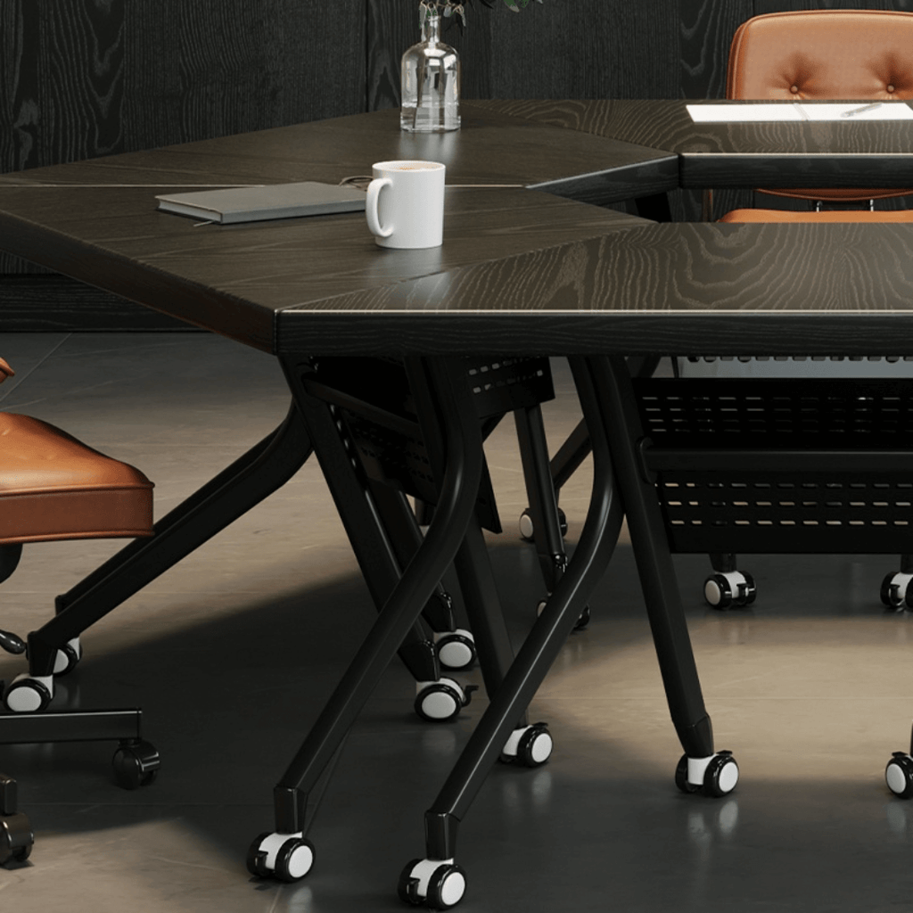 Black folding conference table with 360-degree casters for flexible workspace setups