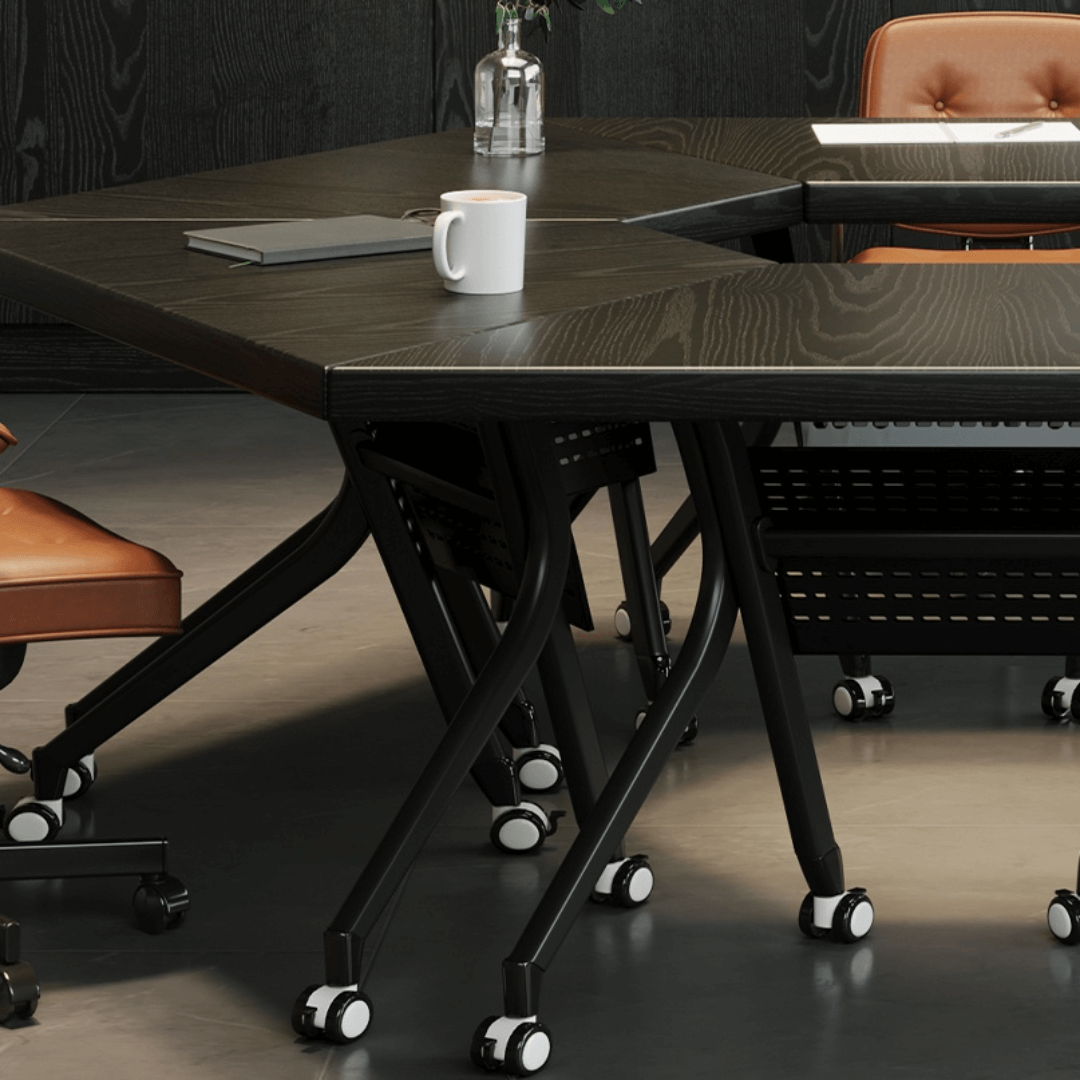 Black folding conference table with 360-degree casters for flexible workspace setups
