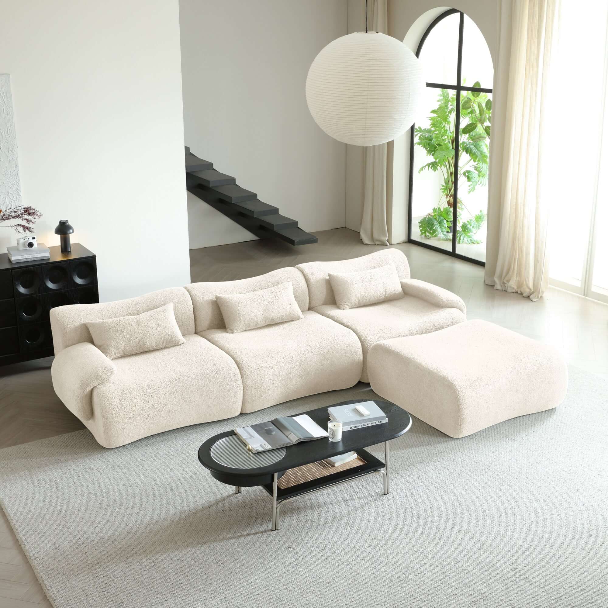 Modern sectional sofa upholstered in soft teddy velvet fabric with modular design