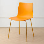 Modern plastic and acrylic side chair with metal legs, ideal for kitchen and dining rooms