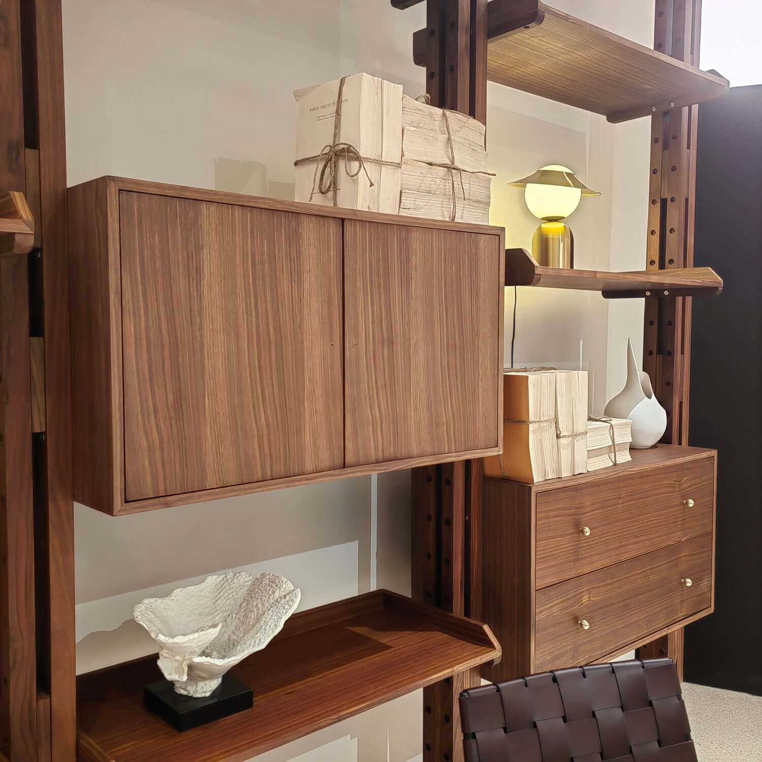 Mid-century modern floor-to-ceiling bookcase with sleek design and ample storage space