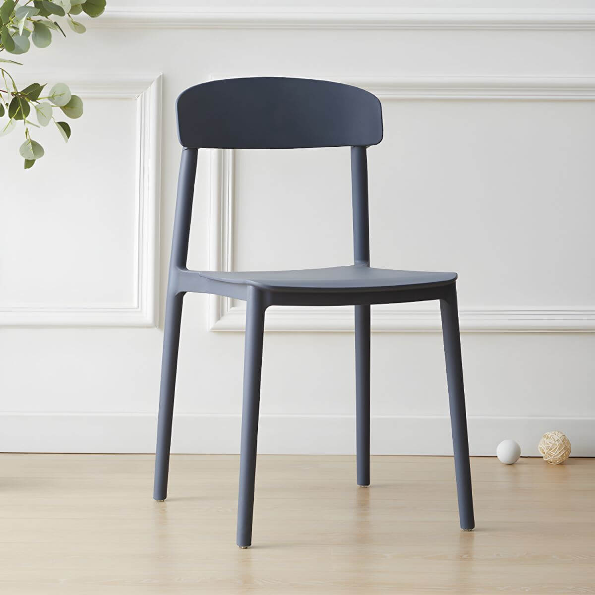 Scandinavian style low back kitchen and dining chair made of plastic and acrylic