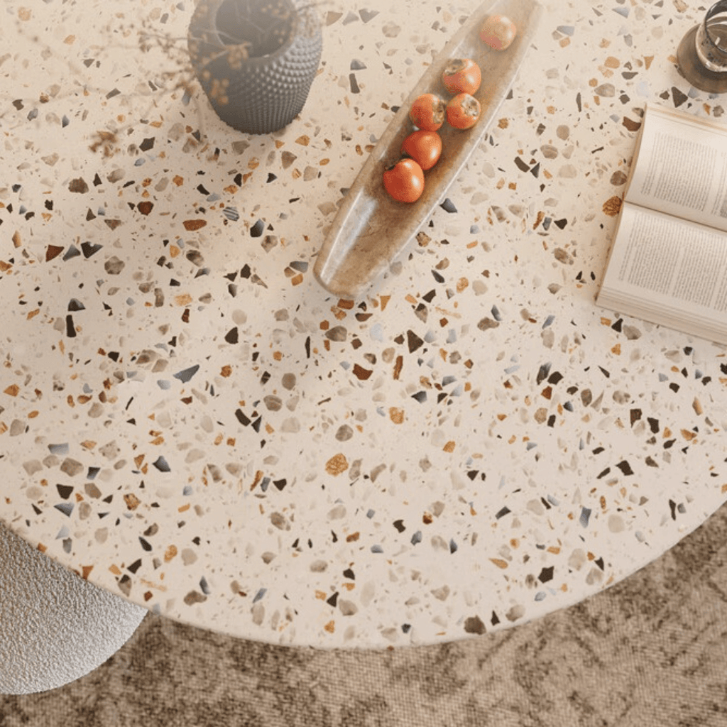 Round terrazzo dining table with durable design, perfect for home gatherings