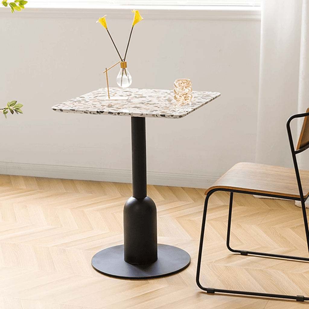 Round terrazzo table ideal for dining or office use with versatile design