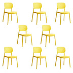 Stackable Scandinavian style plastic and acrylic side chair with low back for dining