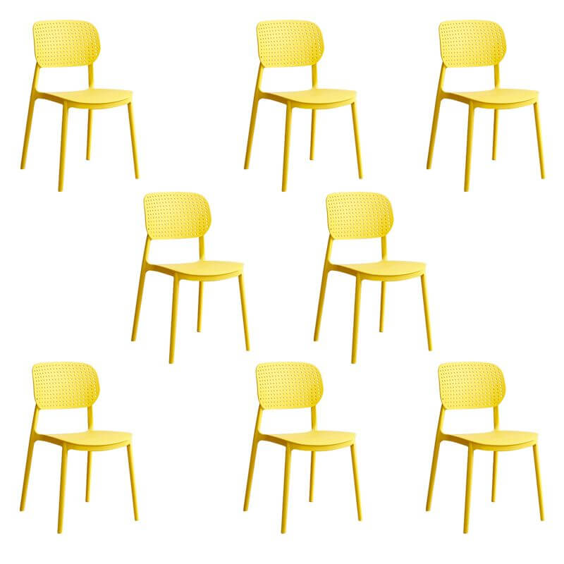 Stackable Scandinavian style plastic and acrylic side chair with low back for dining