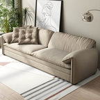 Gray Scandinavian sofa bed with fabric upholstery and coir faux leather sleeper, 69 inches long