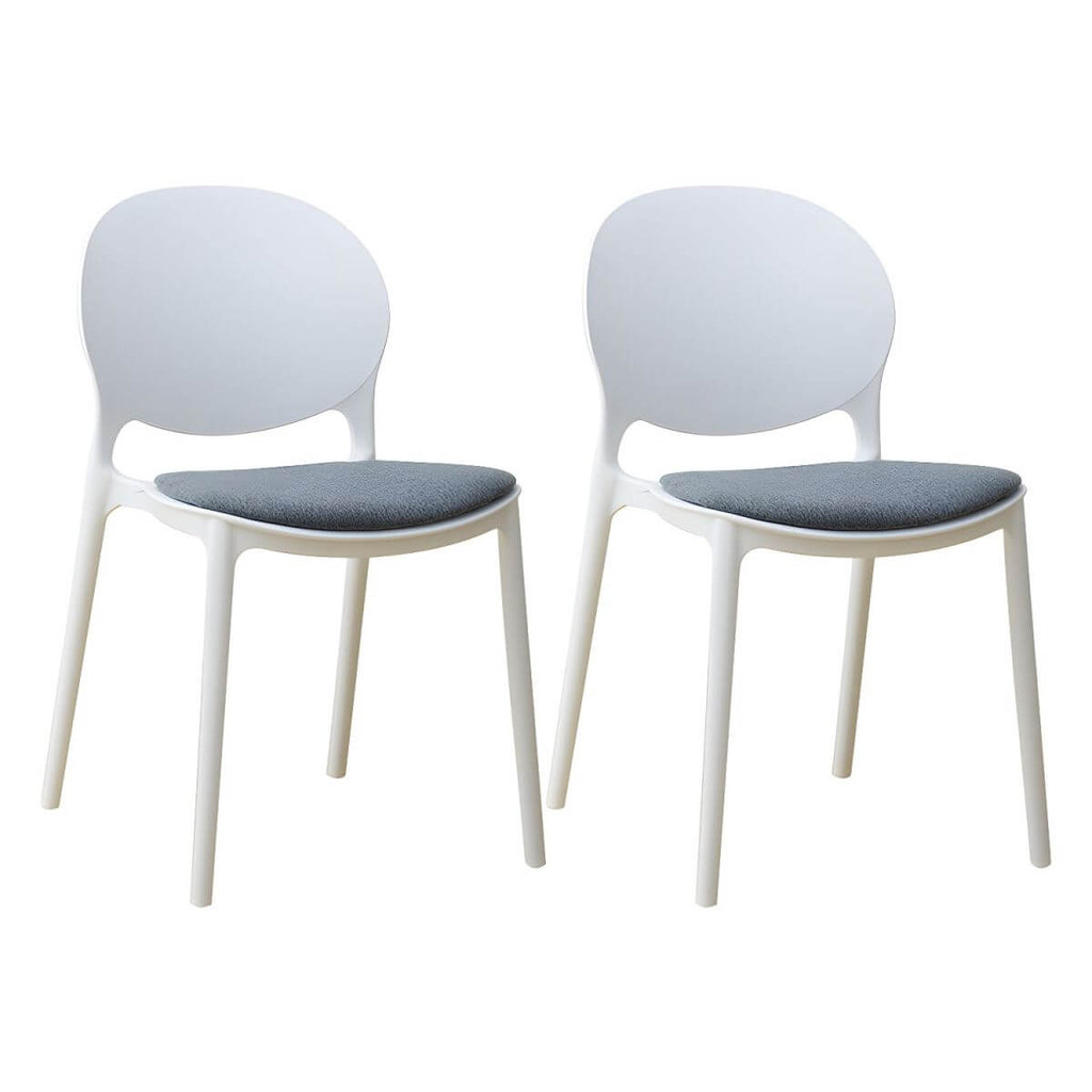 Scandinavian plastic dining chair with open back and four legs, ideal for home use