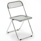 Scandinavian style dining chair with silver metal legs and plastic acrylic seat
