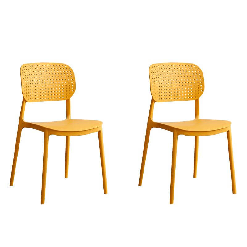 Stackable Scandinavian style plastic and acrylic side chair with low back for dining