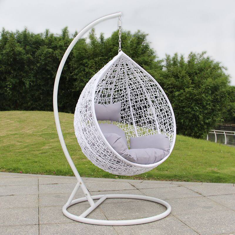 Metal porch swing with stand, cushions, and chain for comfortable outdoor seating