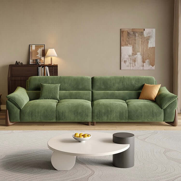 Modern green and white sofa with soft tech fabric, perfect for a cozy living room