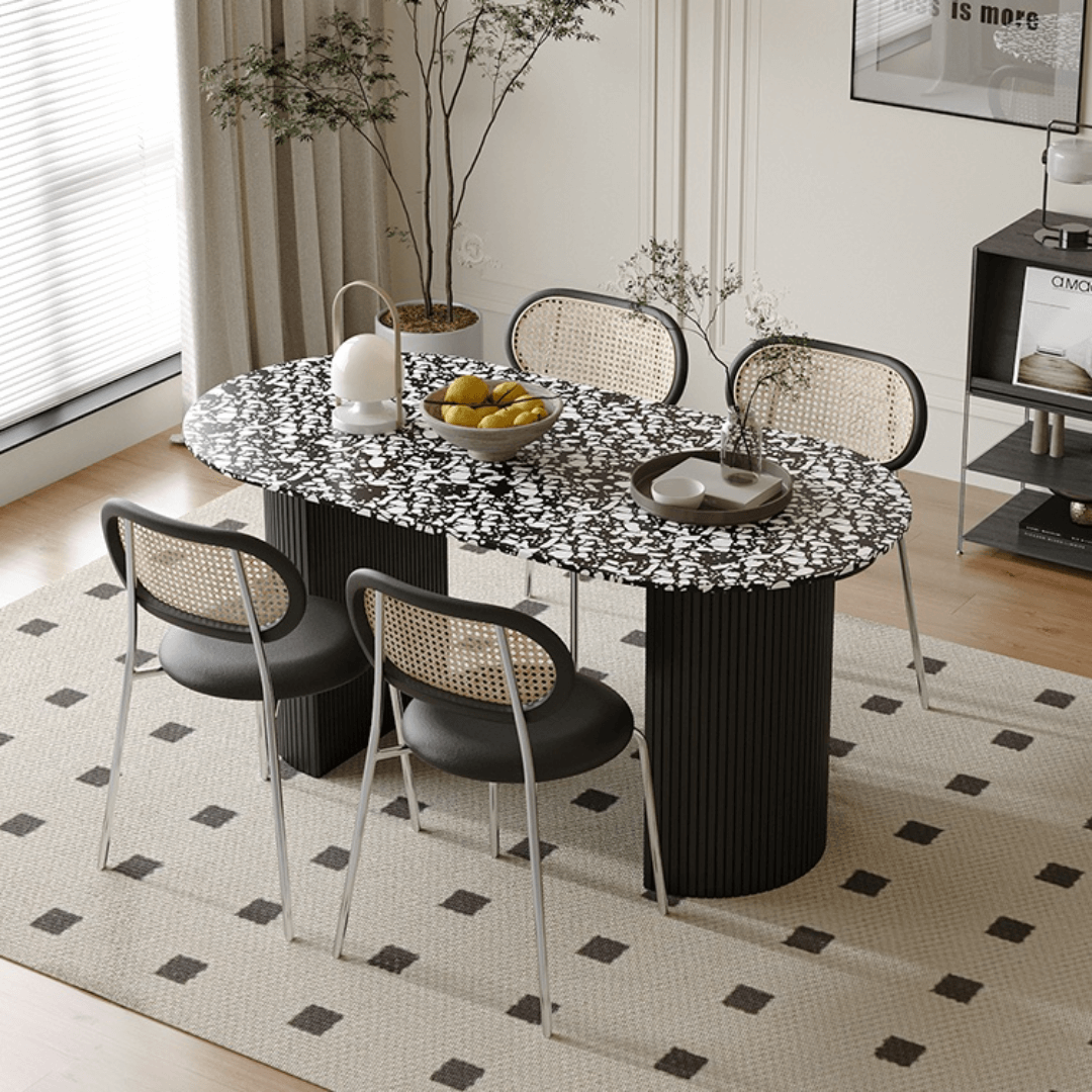 Modern black and white terrazzo dining table with sleek vintage design