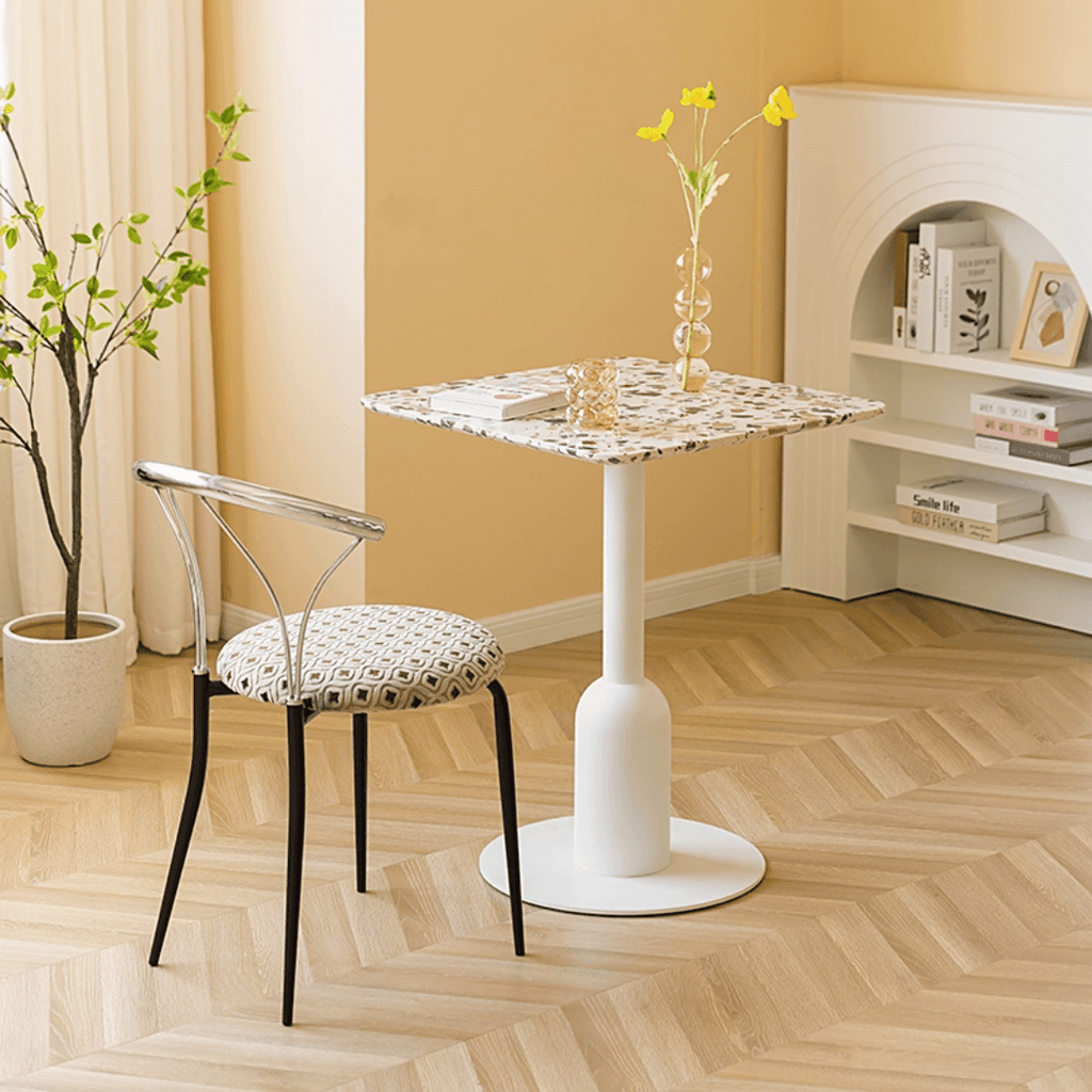 Round terrazzo table ideal for dining or office use with versatile design